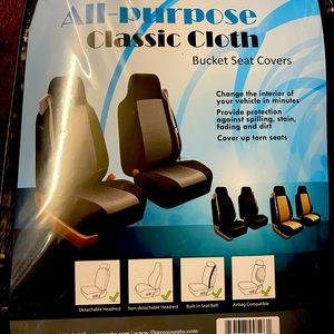 Seat covers for Chevy suburban. Slip on style.NWOT.black w grey inserts